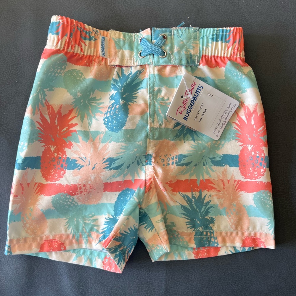 NWT Rugged Butts swim trunks 18-24m